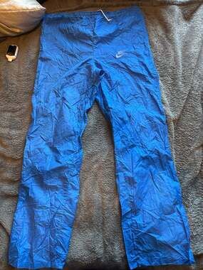 80s Nike Track Pants Size SM Blue Nylon Vintage Sportswear